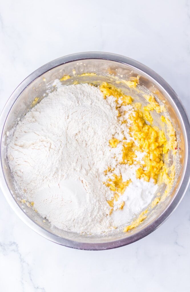 More dry ingredients in a bowl for butterfinger cookie bar recipe