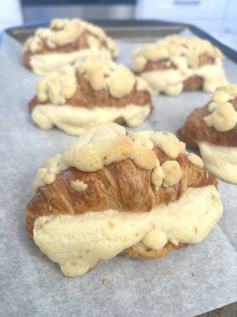 Croissant bursting with stuffed dough