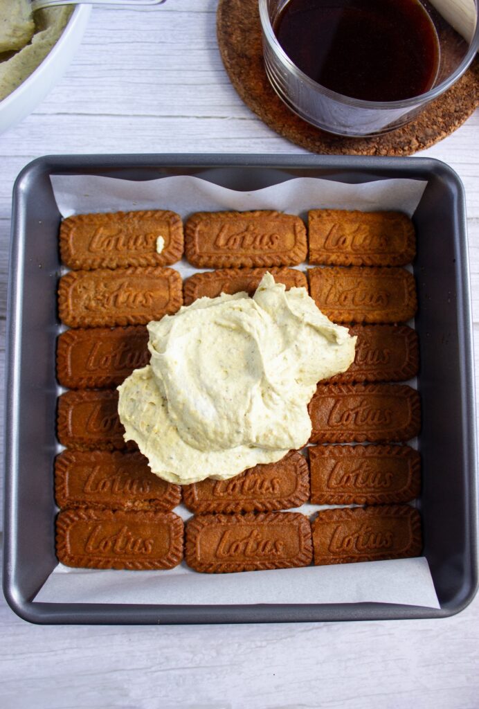 Adding whipped cream to layers of biscoff