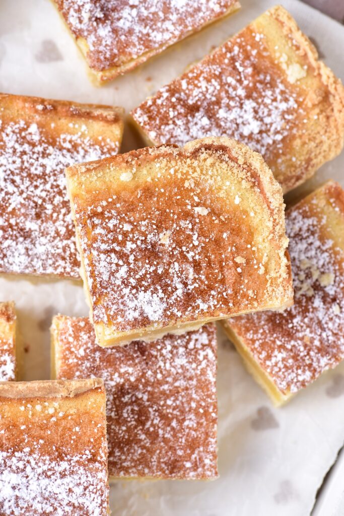 Sliced lemon bars with powdered sugar