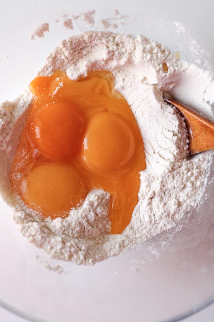 Flour and eggs mixed in a bowl