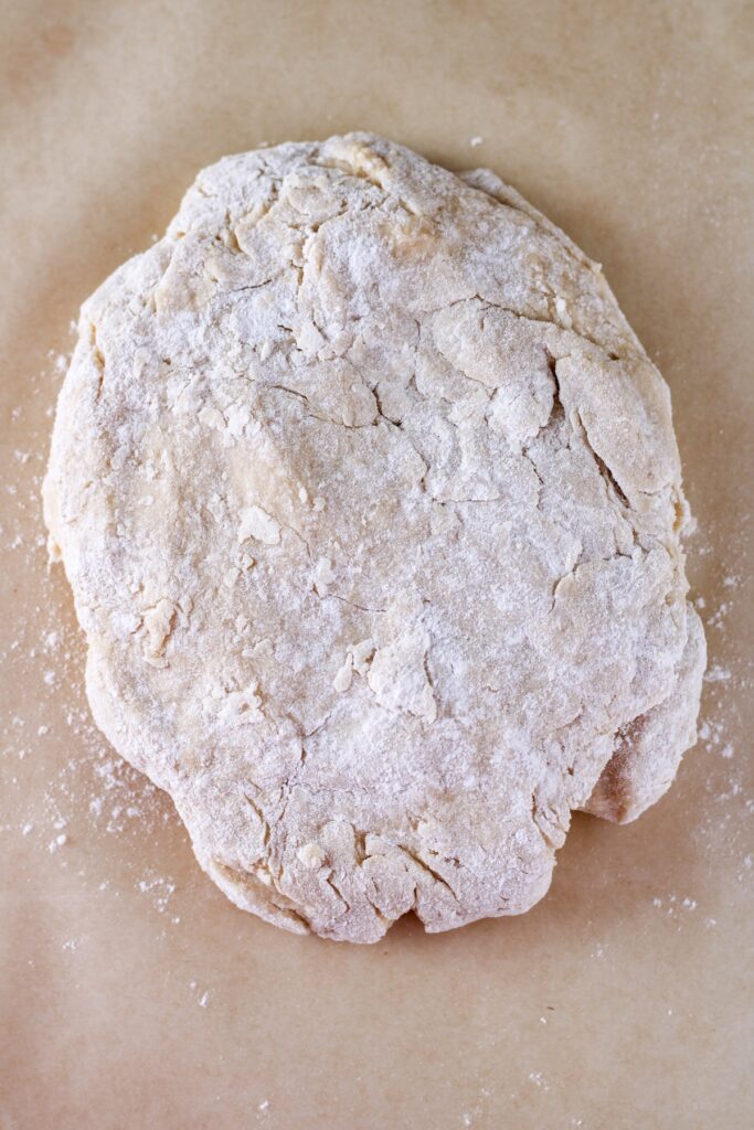 Ball of dough for pink orange home made donuts recipe