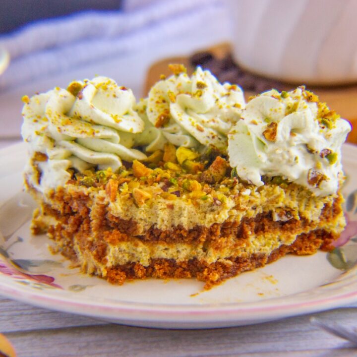 Plate with a slice of pistachio biscoff tiramisu