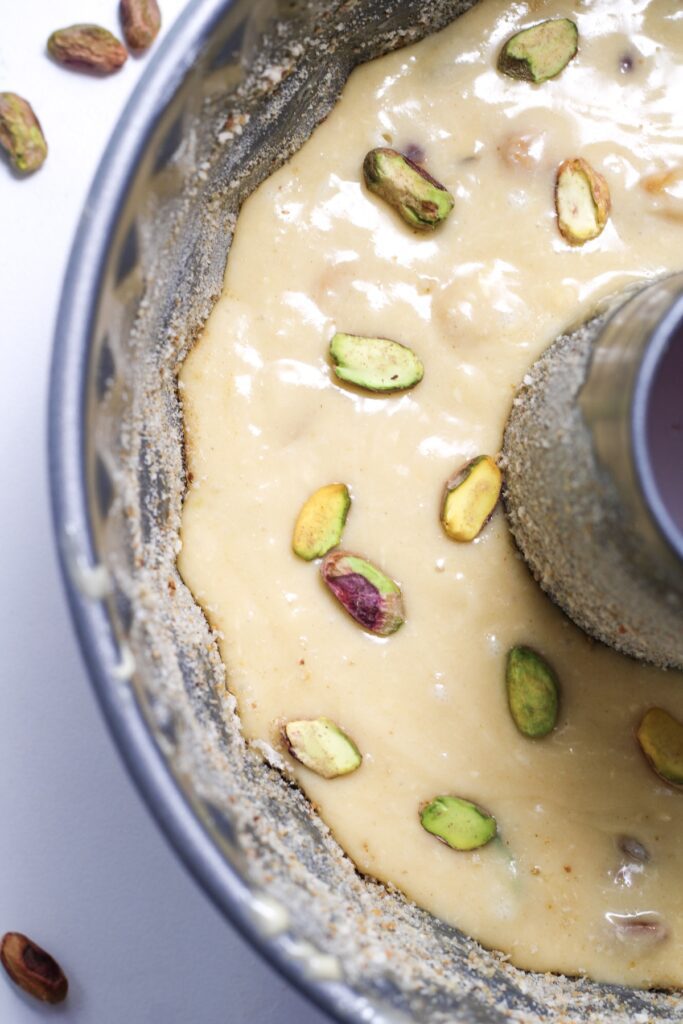 Pistachio batter inside a bundt cake
