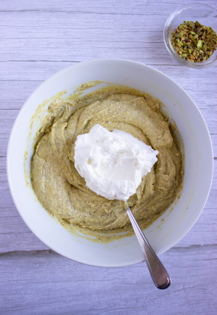 Adding whipped cream to the mascarphone mixture