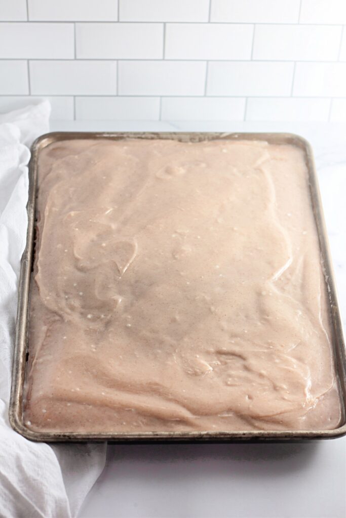 caramel apple sheet cake coated with frosting