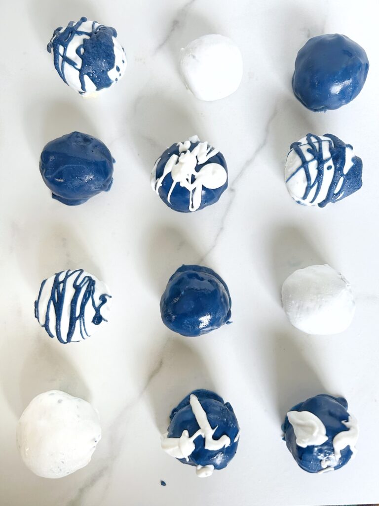 hanukkah oreo balls with white and blue coat