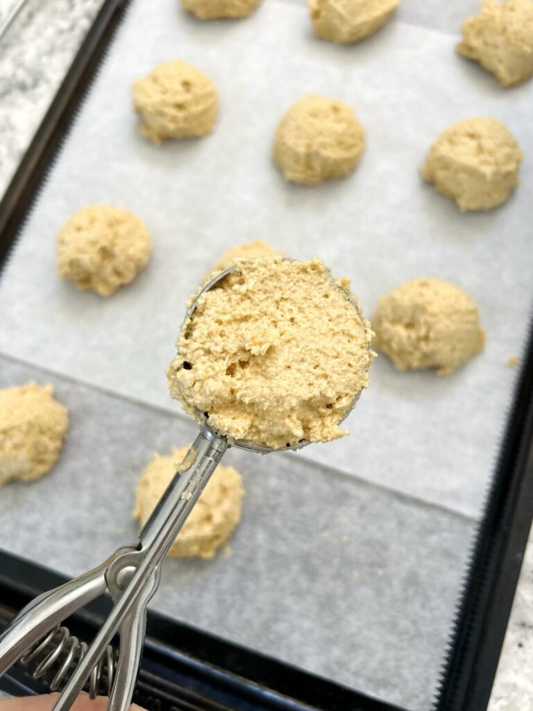 scooping the dough to make cirlces