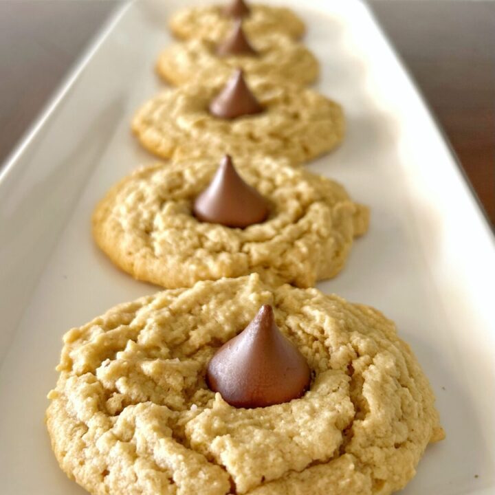 almond flour peanut butter blossom cookies topped with hershet kisses