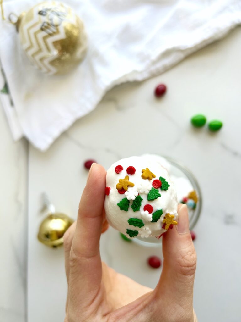 huge ball of christmas golden oreo with green and red sparkles