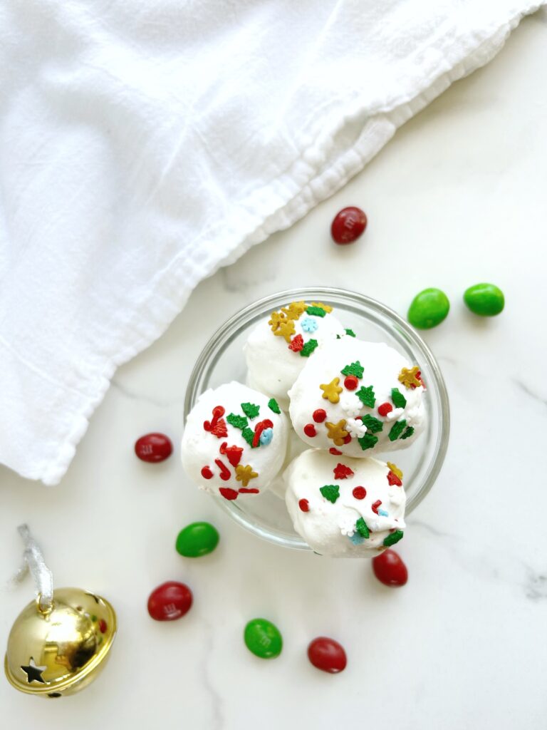 christmas golden oreo balls with green and red sprinkles