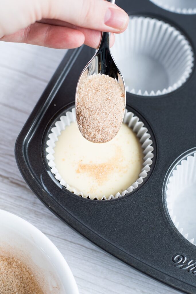 cream cheese mixture on top of muffin batter