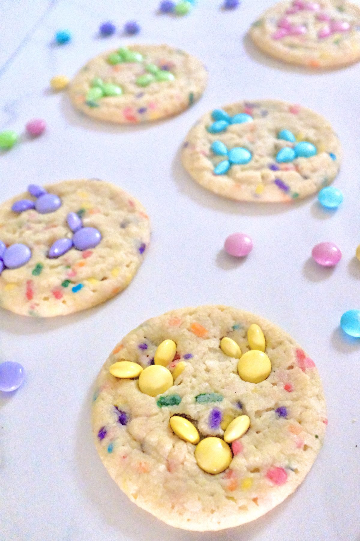 m&m bunny cookies with yellow, blue, purple, and pink m&m candies