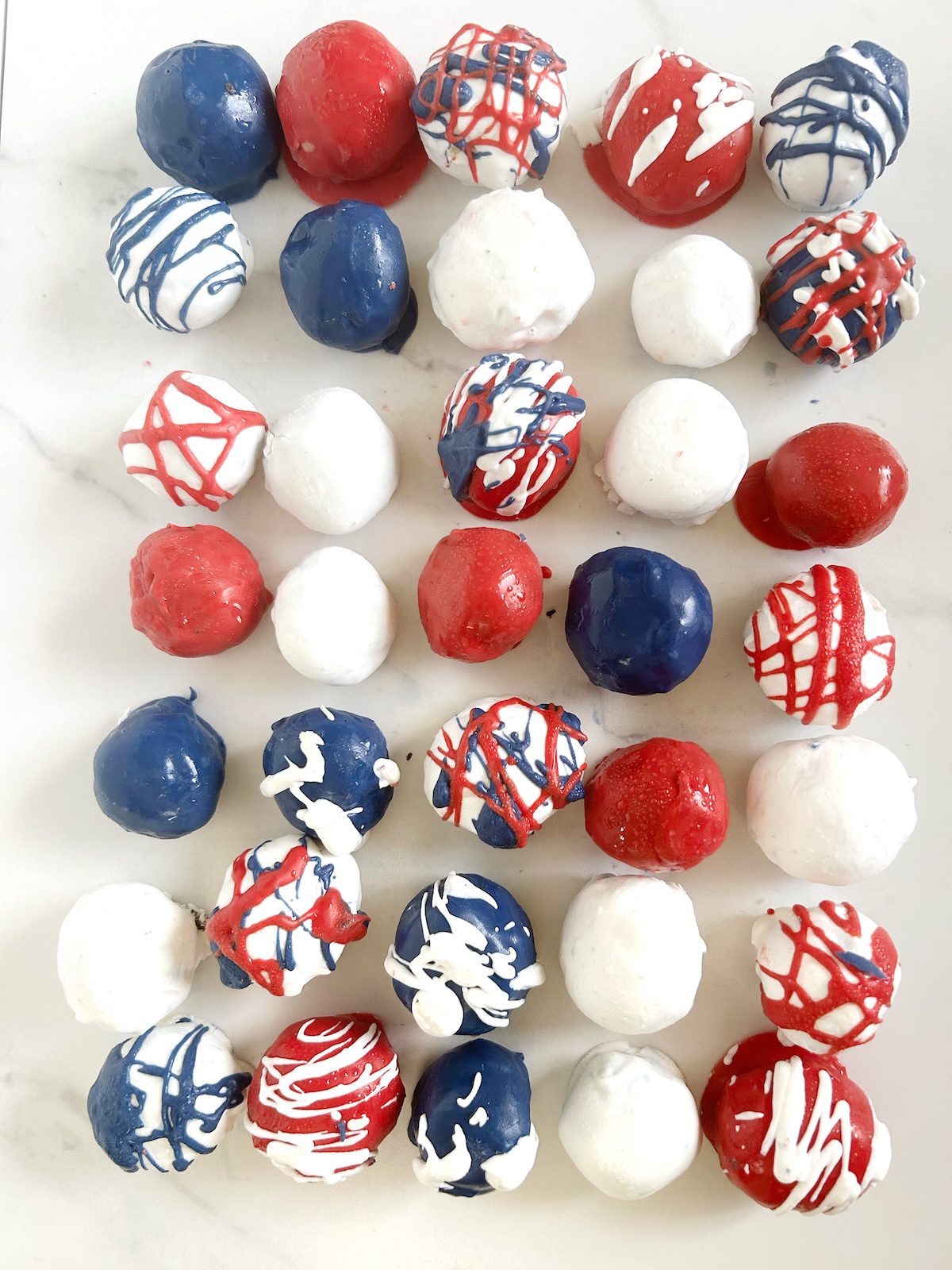 patriotic golden oreo balls with red, white and blue coating that resemble american flag