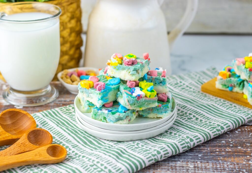 a plate stacked with lucky charm fudge pieces