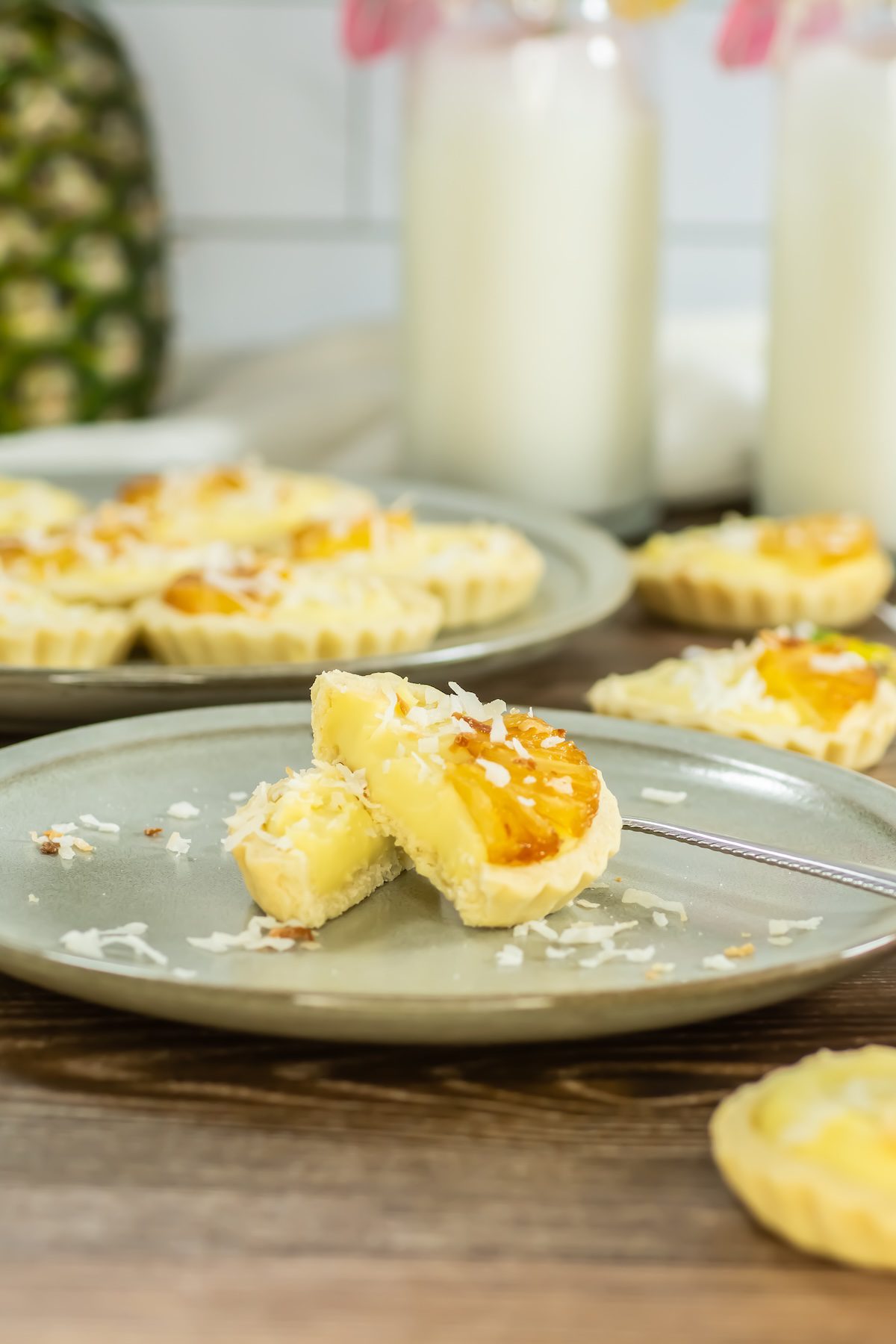 pina colada mini tart cut in half on a plate