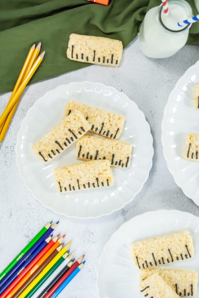 a plate of rice krispie treats that look like rulers