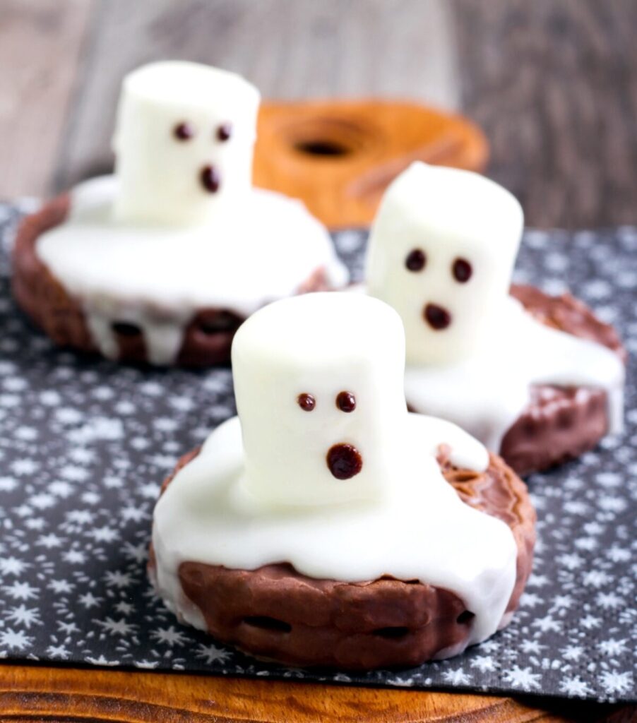 white ghost cookies with marshmallow ghots