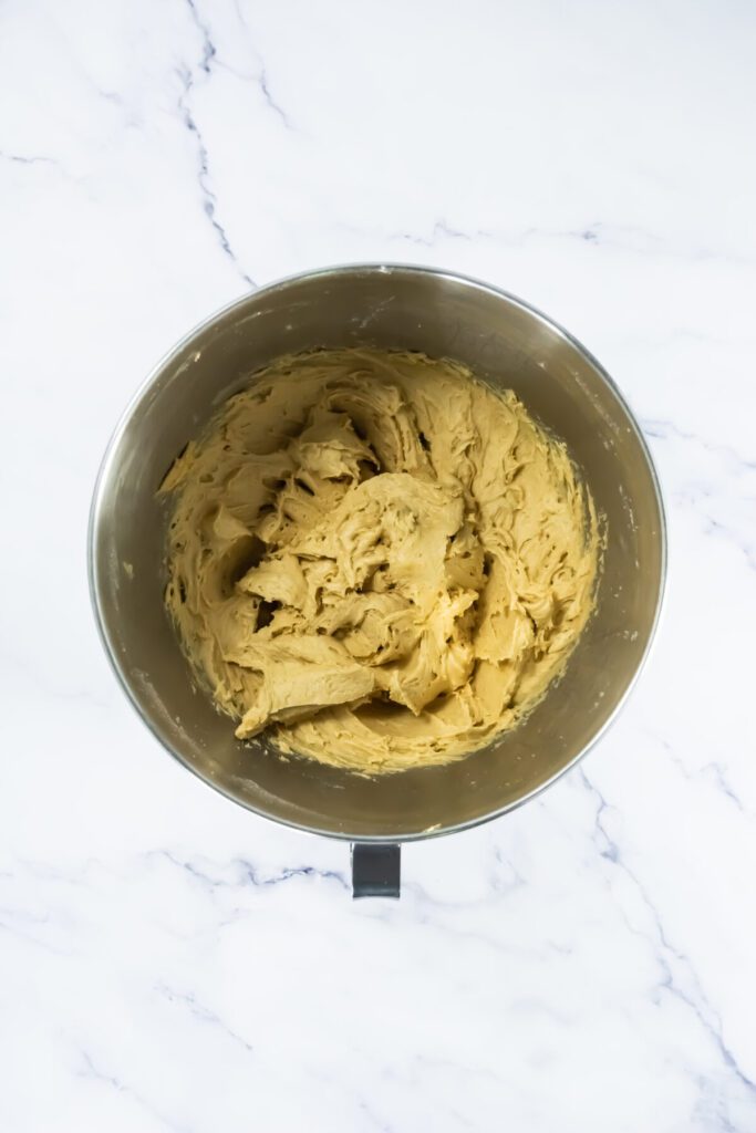 batter in a mixing bowl of pumpkin cookies
