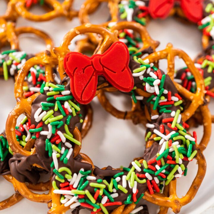 close up of a christmas wreath treat made of pretzels and melted chocolate
