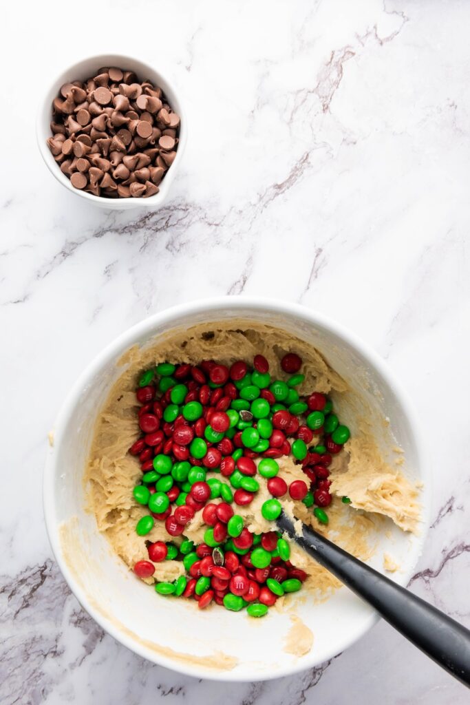 batter to make christmas cookies with m&m's with the m&m's poured on top of the bowl