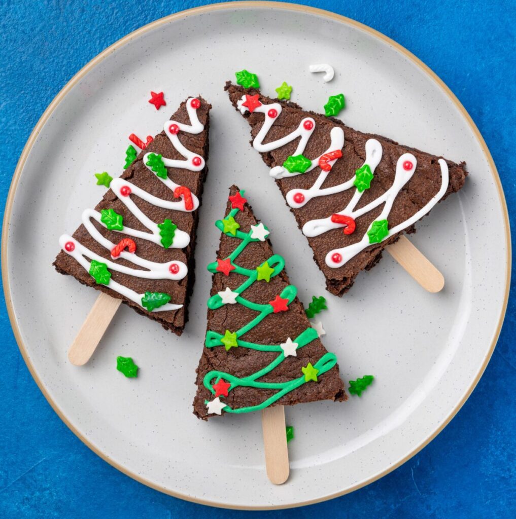 brownies decorated like christmas trees on a plate