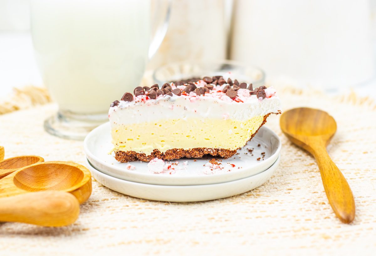close up of a slice of candy cane pie